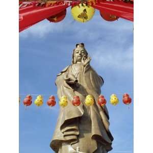  Red and Yellow Lanterns in Front of the Standing Statue of Kuan Yim 