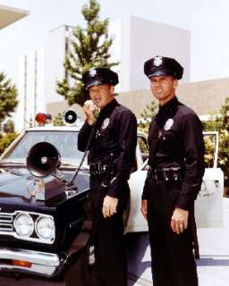   Pete Malloy and Kent McCord as Officer James A. Jim Reed in Adam 12