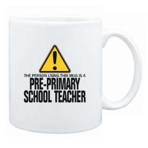   Mug Is A Pre Primary School Teacher  Mug Occupations: Home & Kitchen