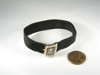 DIMENSIONS  Bracelet 6 ½ inches long, band 12 mm wide. Clasp face 18 