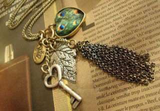 Antiqued Bronze Heart Peacock feather Tassel Necklace