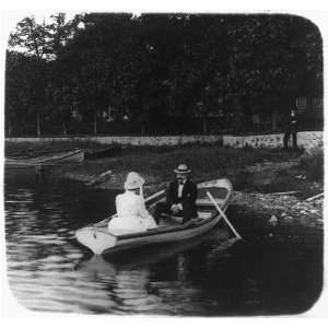  For old times sake,Couple in rowboat,c1900,shoreline