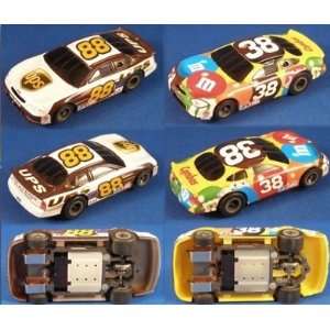    Life Like Twin Pack UPS and M&M HO Scale Slot Cars: Toys & Games