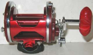   Jigmaster FISHING REEL w/RED ACCURATE AccuFrame &RED Alum SPOOL~MINTY