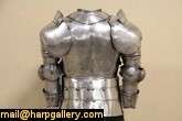 Hand hammered in Italy, a set of wearable armor and a helmet are about 
