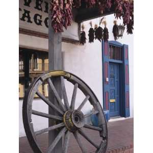 Antique wagon wheel, Old Town Albuquerque, New Mexico Photographic 