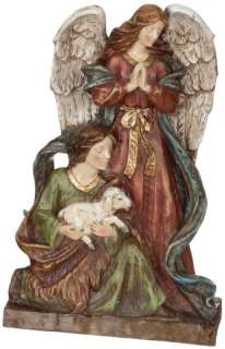 This colorful shepherd and angel statue makes a beautiful addition to 