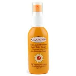  Clarins Self Tanners   1.7 oz Self Tanning Face Lotion SPF 